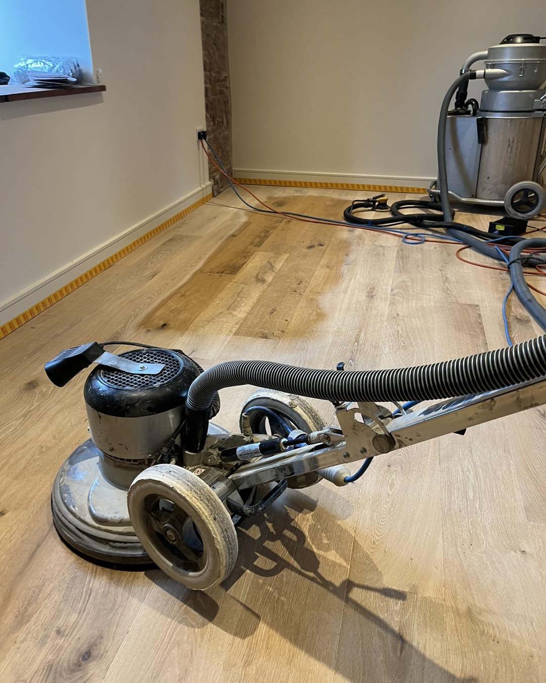 Floor sanding machine in action Exeter