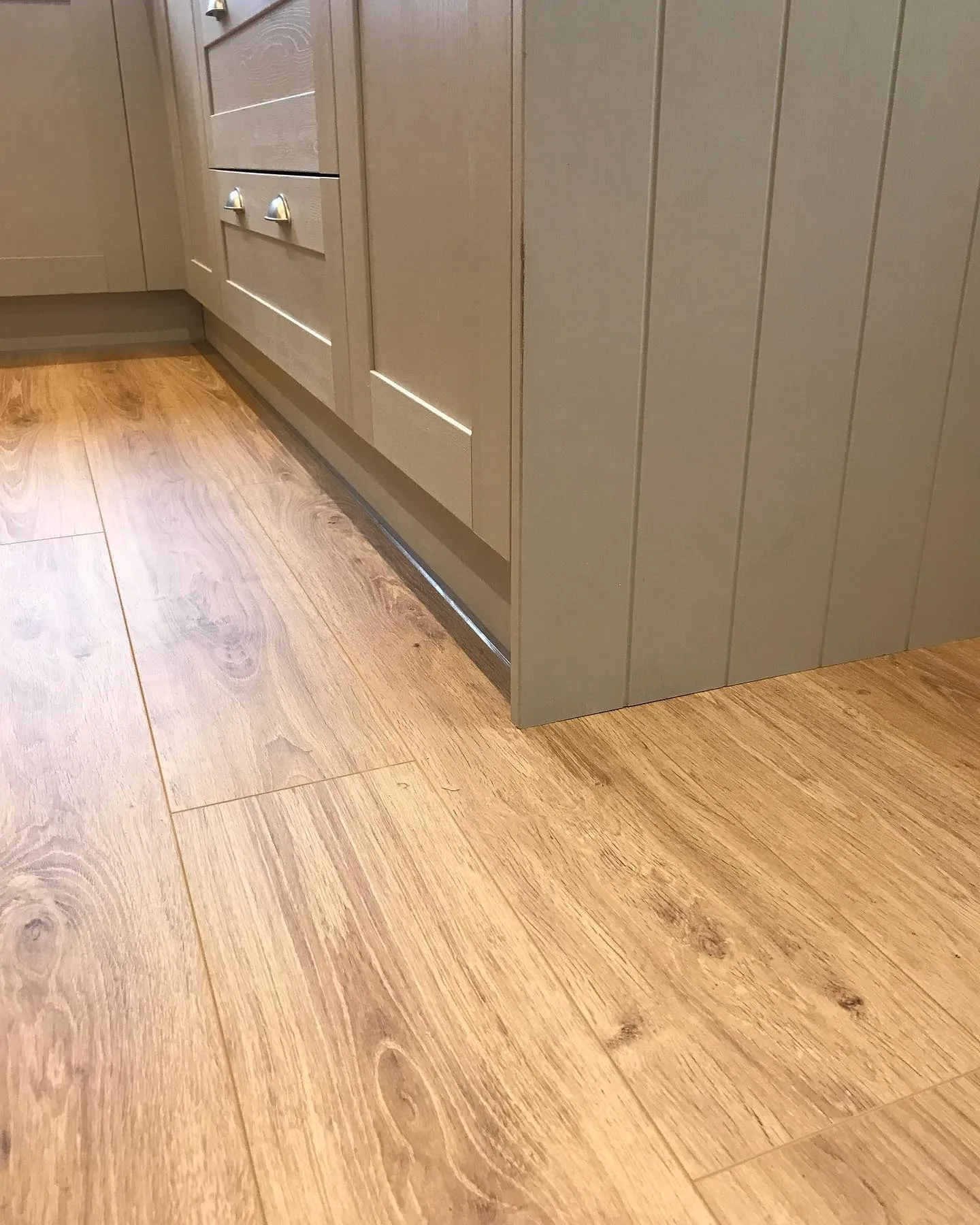 Oak effect flooring installed in kitchen Exeter
